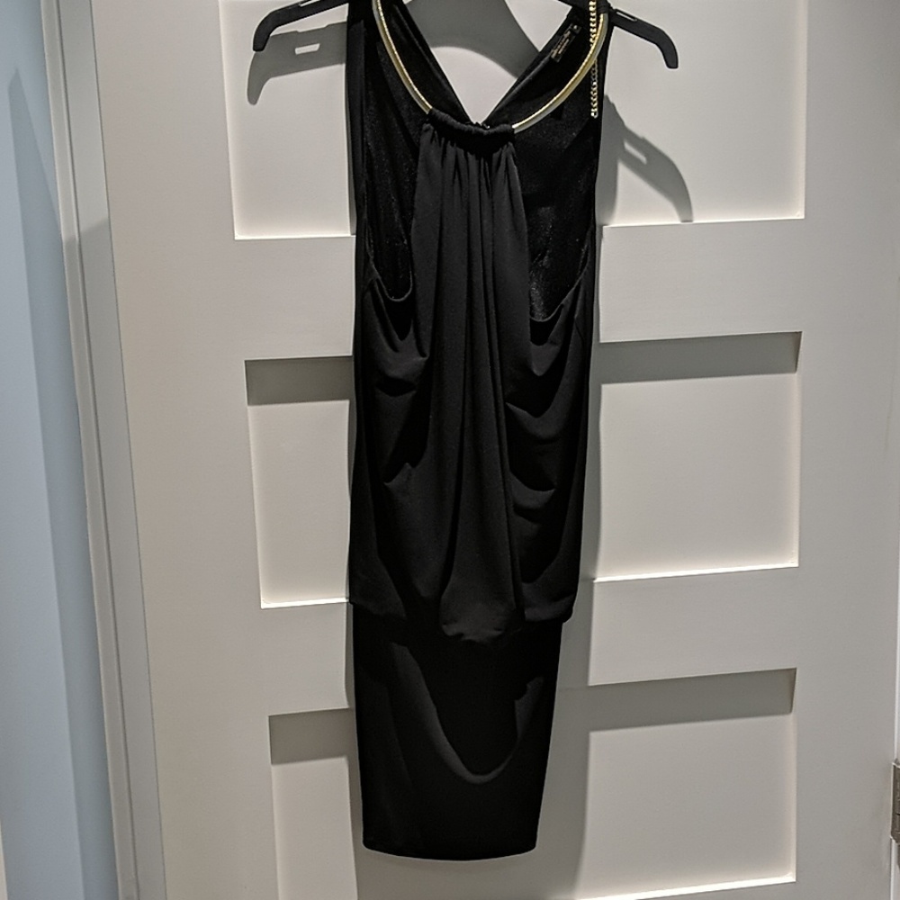 Cocktail dress fitted in all the right places.